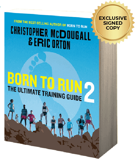 Book titled 'Born to Run 2' by Christopher McDougall and Eric Orton with a blue cover and silhouette design. Exclusive signed copy seal in right corner